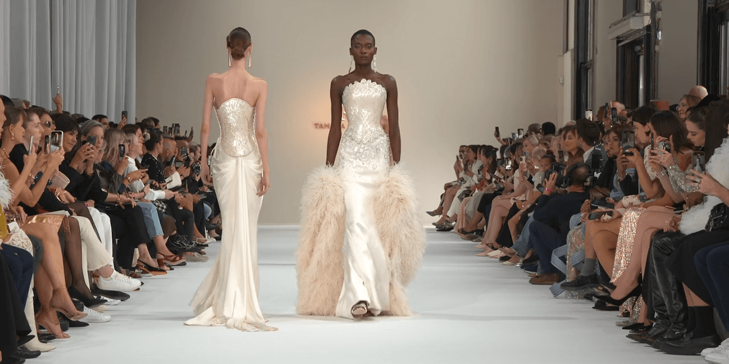 Elegant model seated on wooden staircase
